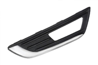 FOCUS Front bumper grille with fog light holes left (FDL01331313L)